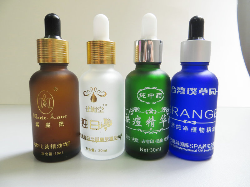 精油瓶高温丝印厂，精油瓶丝印烫金厂，精油瓶磨砂蒙砂厂