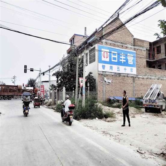 伊犁墙体涂料广告,伊犁医院墙体广告传递出美好信念
